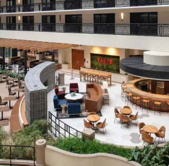 Spacious and comfortable hotel area perfect as workspace at the Embassy Suites by Hilton San Francisco Airport.