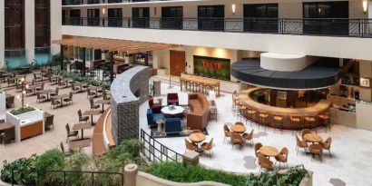 Spacious and comfortable hotel area perfect as workspace at the Embassy Suites by Hilton San Francisco Airport.