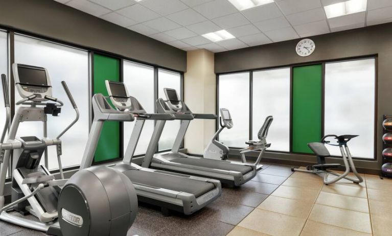 Fully equipped fitness center at the Embassy Suites by Hilton Salt Lake City West Valley.