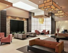 Elegant workspace in a hotel lobby at the Embassy Suites by Hilton Salt Lake City West Valley.