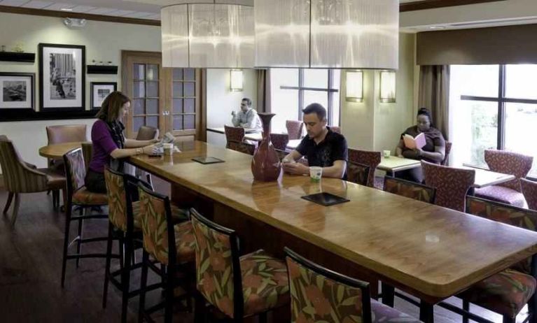 Dining area perfect as workspace at the Hampton Inn Springfield South Enfield.