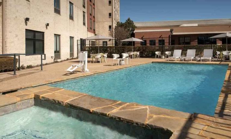 Relaxing outdoor pool area at the Hilton Garden Inn Dallas/Duncanville.