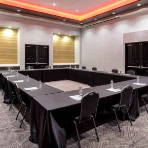 Meeting room with square table at the Hilton Garden Inn Hays.