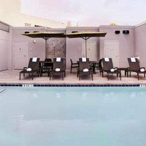 Relaxing indoor pool at the Hampton Inn & Suites by Hilton-Irvine/Orange County Airport.