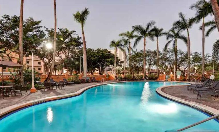 Outdoor swimming pool at the Embassy Suites by Hilton Miami - International Airport.