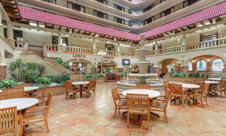 Workspace in a hotel lobby at the Embassy Suites by Hilton Kansas City Plaza.