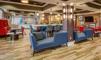 colorful lobby and coworking space at Hampton Inn San Francisco Airport.