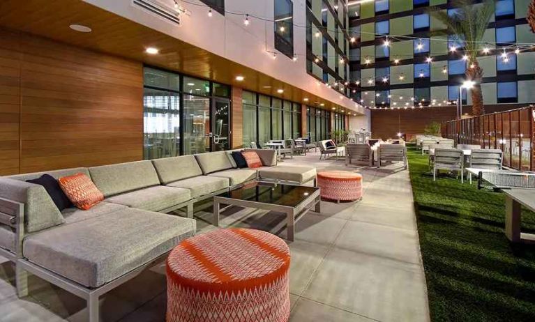 spacious outdoor lounge and coworking space at Hampton Inn & Suites Las Vegas Convention Center.