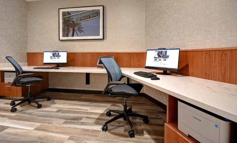 dedicated business center with PC, internet, printer, and work desk at Home2 Suites by Hilton Las Vegas Convention Center.