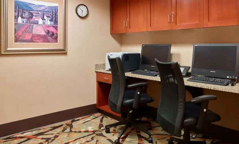 Working station with computers and printer at the Hampton Inn & Suites North Conway.