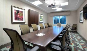 Meeting room with table at the Hilton Garden Inn Minneapolis Airport Mall of America.