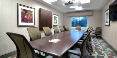 Meeting room with table at the Hilton Garden Inn Minneapolis Airport Mall of America.