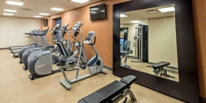 Fitness center with treadmills and mirror at the Hilton Garden Inn Minneapolis Airport Mall of America.