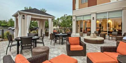 Beautiful outdoor patio perfect as workspace at the Hilton Garden Inn Minneapolis Airport Mall of America.