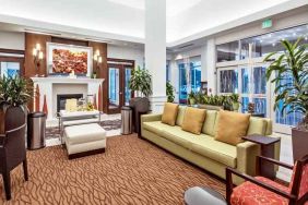 Workspace with lounges in a hotel lobby at the Hilton Garden Inn Minneapolis Airport Mall of America.