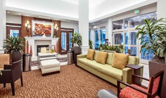 Workspace with lounges in a hotel lobby at the Hilton Garden Inn Minneapolis Airport Mall of America.