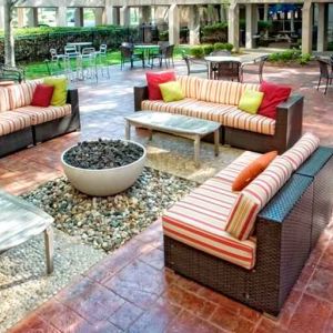 Beautiful outdoor patio with garden perfect as workspace at the DoubleTree by Hilton Kansas City - Overland Park.