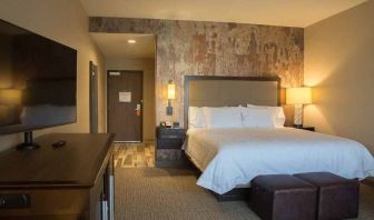 comfortable king bed with TV at Hampton Inn & Suites Murrieta Temecula.