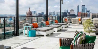 Beautiful rooftop-coworking space with city views at Hilton Garden Inn Austin University.