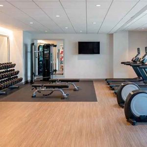 well-equipped fitness center at at Hilton Garden Inn Austin University.