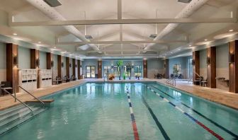 large indoor pool ideal for athletic swimming at Embassy Suites by Hilton Myrtle Beach Oceanfront Resort.