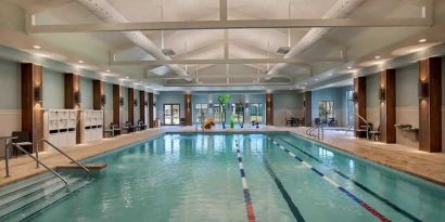 large indoor pool ideal for athletic swimming at Embassy Suites by Hilton Myrtle Beach Oceanfront Resort.