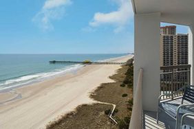 beautiful balcony with sea views ideal for digital nomads to work from at Embassy Suites by Hilton Myrtle Beach Oceanfront Resort.