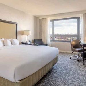 spacious king room with work area and natural light at Washington Hilton.