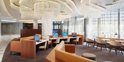 spacious and well-lit coworking space and business center ideal for remote working at Washington Hilton.