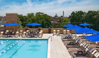 gorgeous outdoor pool with seating and sun beds at Washington Hilton.