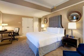 spacious king room with work desk perfect for remote work at Hilton Milwaukee City Center.