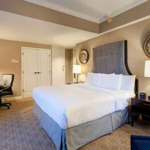 spacious king room with work desk perfect for remote work at Hilton Milwaukee City Center.