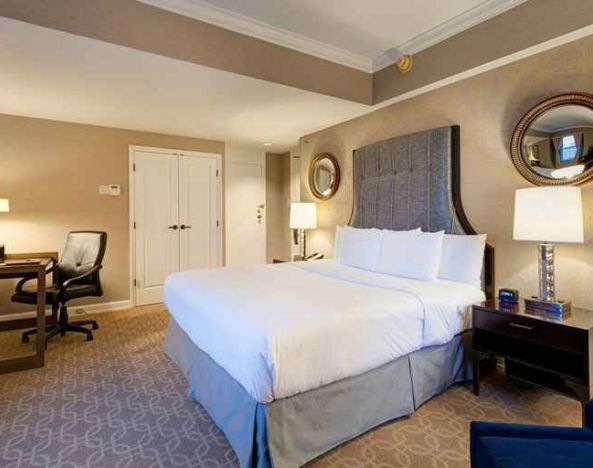 spacious king room with work desk perfect for remote work at Hilton Milwaukee City Center.