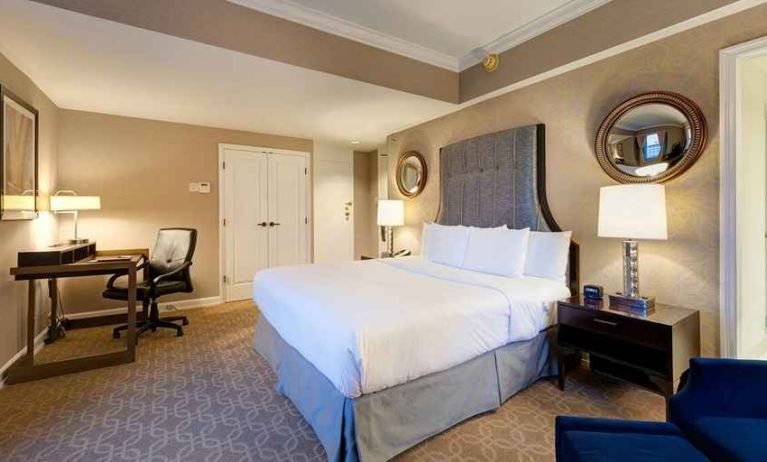 spacious king room with work desk perfect for remote work at Hilton Milwaukee City Center.