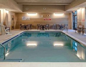 relaxing and accessible indoor pool with seating area at Hampton Inn & Suites San Jose Airport.