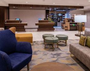 comfortable lounge and lobby area ideal for coworking at Hilton Garden Inn Kansas City Airport.