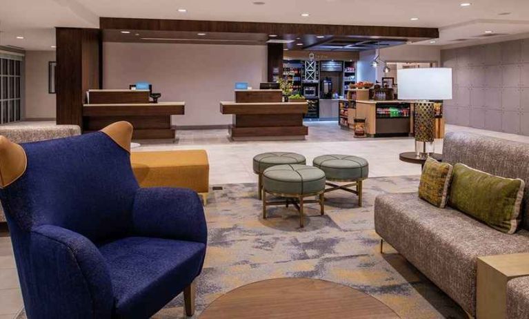 comfortable lounge and lobby area ideal for coworking at Hilton Garden Inn Kansas City Airport.