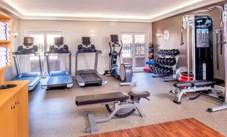 Fitness center with treadmills and weights at the Hilton Wilmington-Christiana.