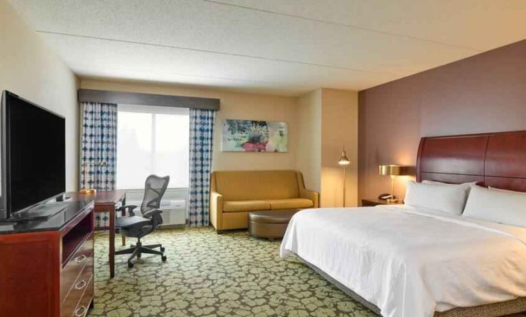 Large king guestroom with working station at the Hilton Garden Inn Hershey.