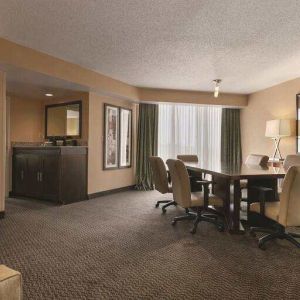 Living room with working station at the Embassy Suites by Hilton Birmingham.