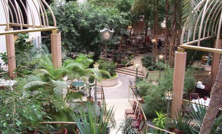 Beautiful outdoor patio with garden at the Embassy Suites by Hilton Birmingham.