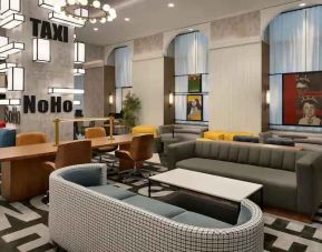 Stylish workspace in a hotel lobby at the DoubleTree by Hilton New York Downtown.