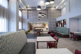 Spacious and comfortable worskpace in a hotel lobby at the Hampton Inn & Suites North Attleboro.