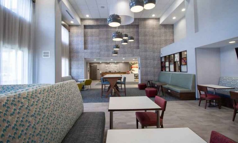 Spacious and comfortable worskpace in a hotel lobby at the Hampton Inn & Suites North Attleboro.