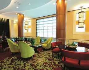 cosy lobby and lounge area ideal for coworking at Embassy Suites by Hilton Houston Downtown.