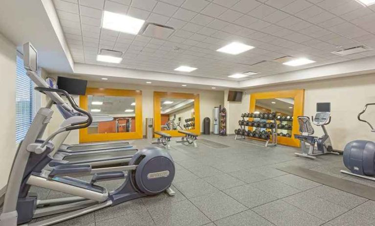 well-equipped fitness center at Homewood Suites by Hilton Houston Downtown.