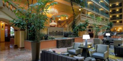 comfortable lobby lounge area ideal for coworking at Embassy Suites by Hilton Los Angeles International Airport South.