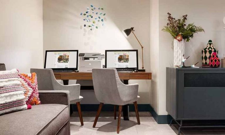 well-equipped business center with internet, printer, and work desks ideal for remote work at Hilton Garden Inn Boulder.