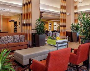 colorful lobby lounge area ideal for coworking at Hilton Garden Inn St. Louis Airport.