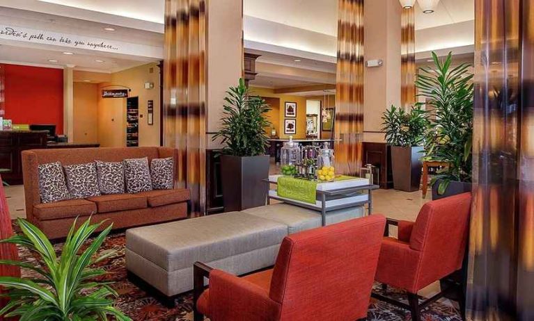 colorful lobby lounge area ideal for coworking at Hilton Garden Inn St. Louis Airport.